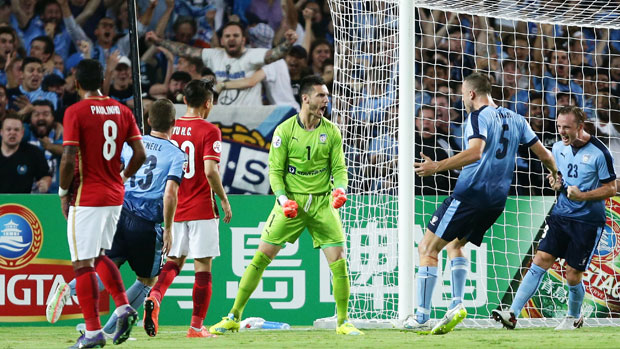 Sky Blues gloveman Vedran Janjetovic celebrate after saving a penalty against Guangzhou Evergrande.