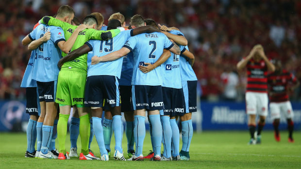 Sydney FC players before kick-off in Saturday night's Sydney Derby.