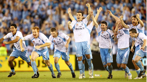 Sydney FC players celebrate their penalty shoot-out win in the 2010 Grand Final.