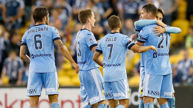 Sydney FC players congratulate Filip Holosko for his goal against Melbourne Victory in the Big Blue.