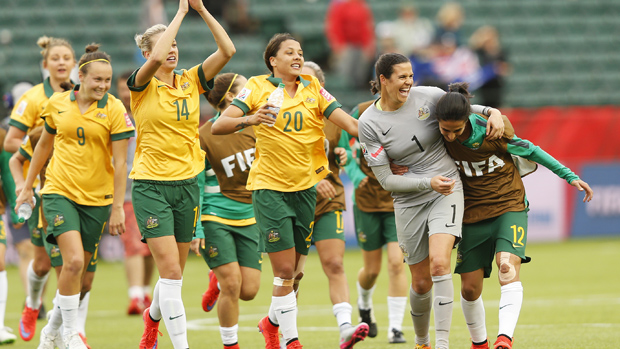 Matildas players celebrate at the 2015 World Cup in Canada.