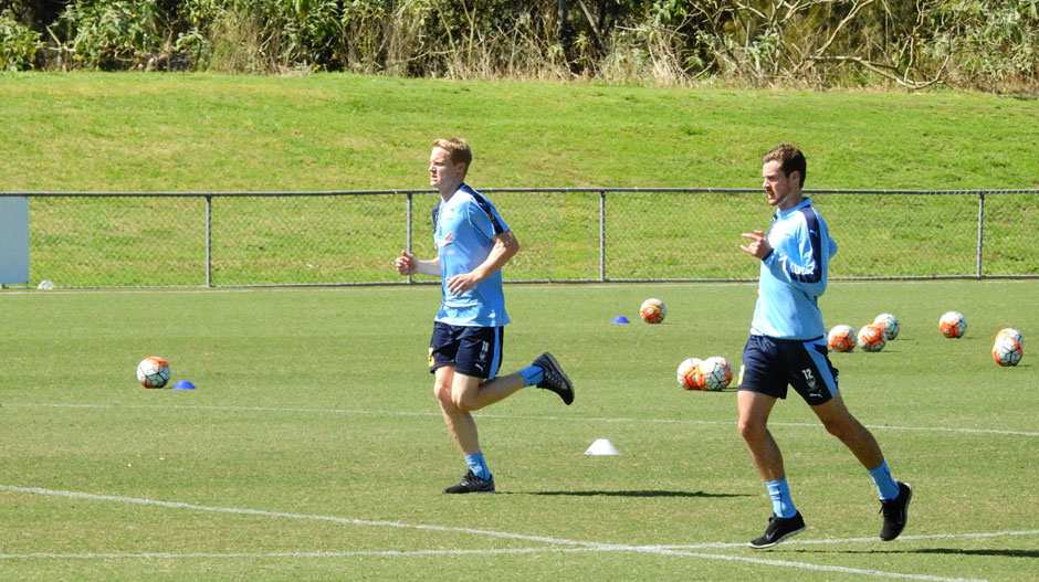 Matt Simon strides out during the session.